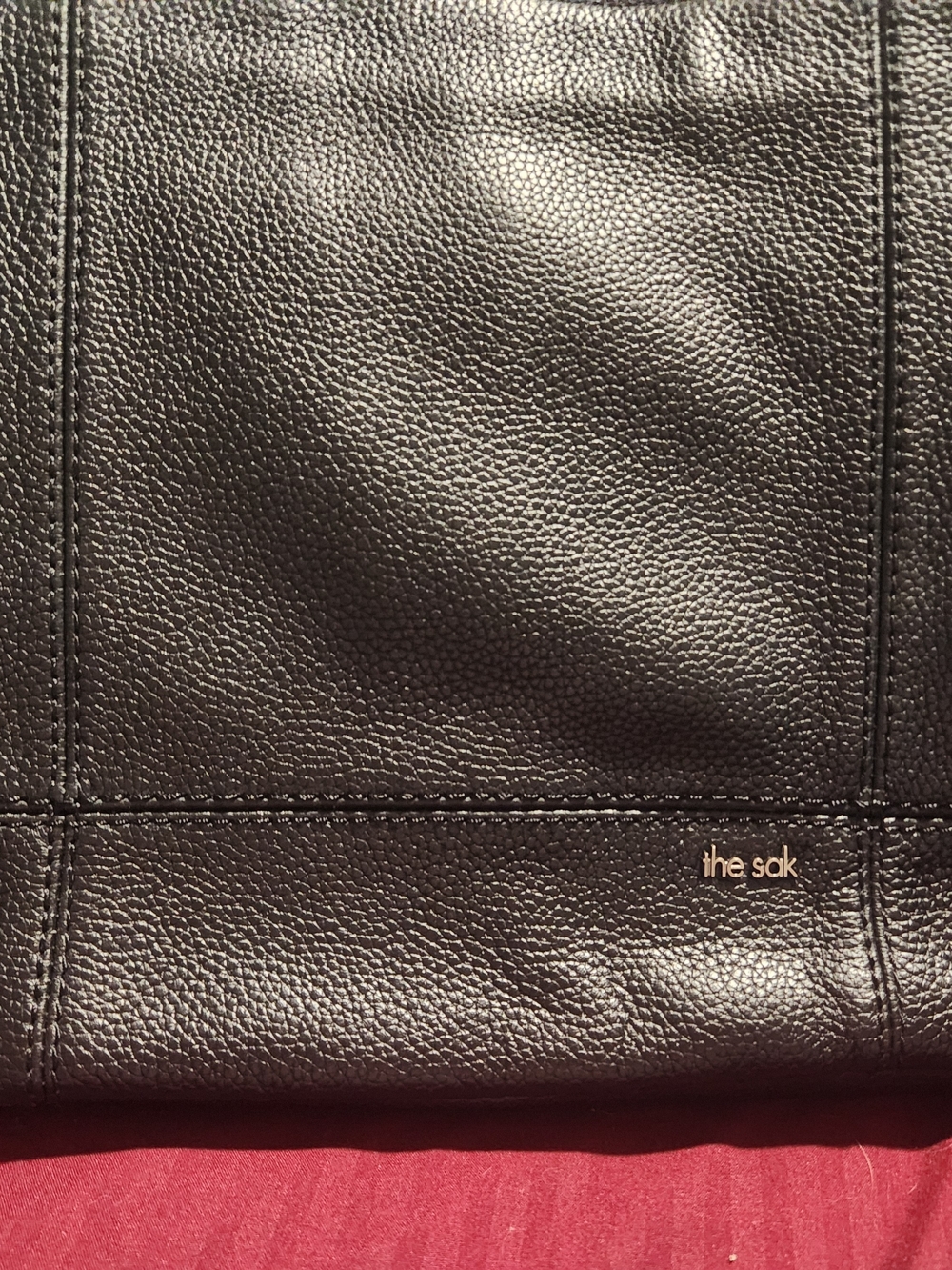The Sak Black Pebbled Leather Messenger Bag